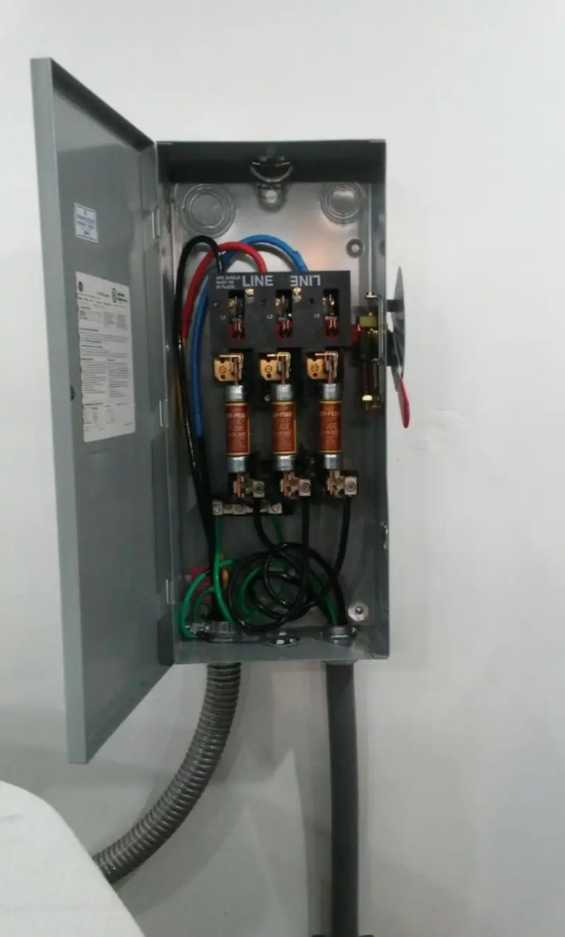 Three-phase disconnect switch installed for Smoke Detector Installation in West Samoset